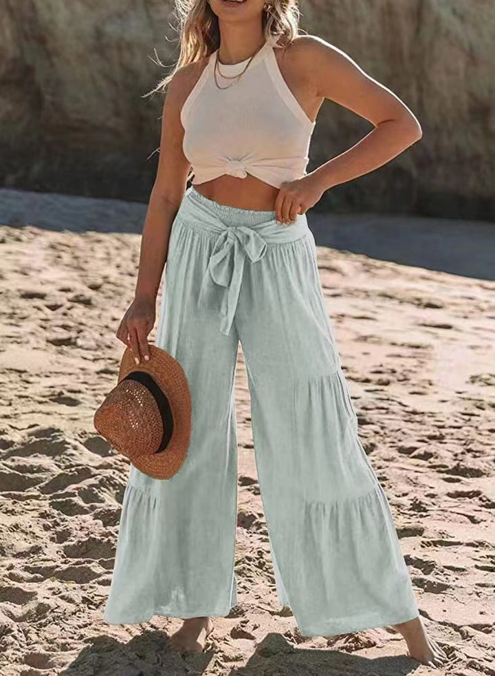 Damernas vida strandbyxor med voluminösa volanger och knytbälte Mirla-Eva Jonsson