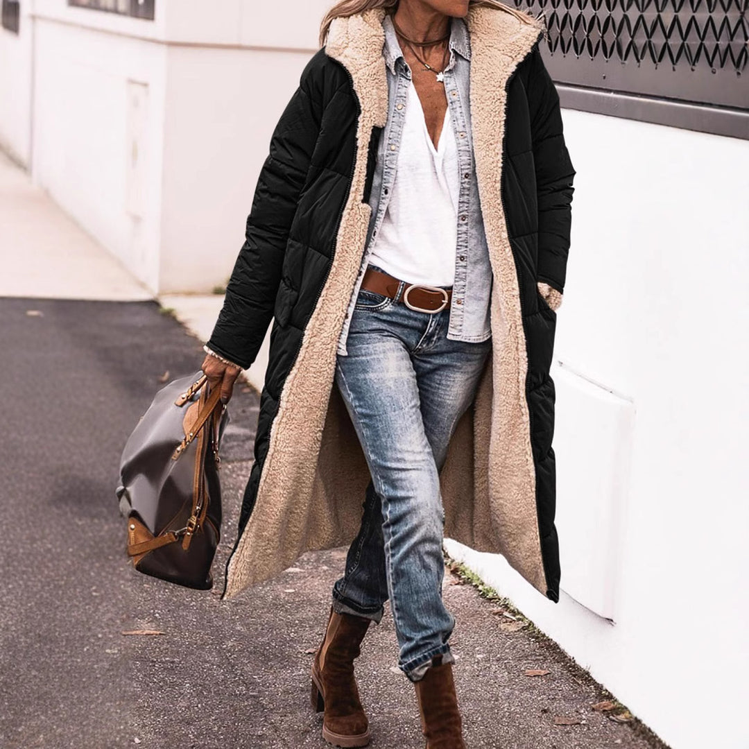 Damernas vinterjacka i avslappnad oversized stil med huva och sidofickor Eva Jonsson-Eva Jonsson
