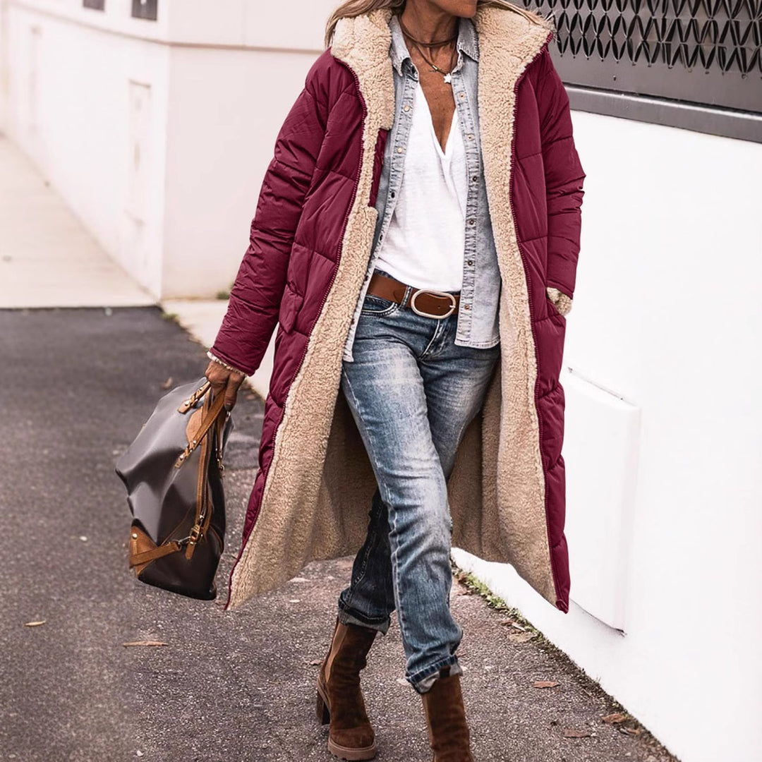 Damernas vinterjacka i avslappnad oversized stil med huva och sidofickor Eva Jonsson-Eva Jonsson