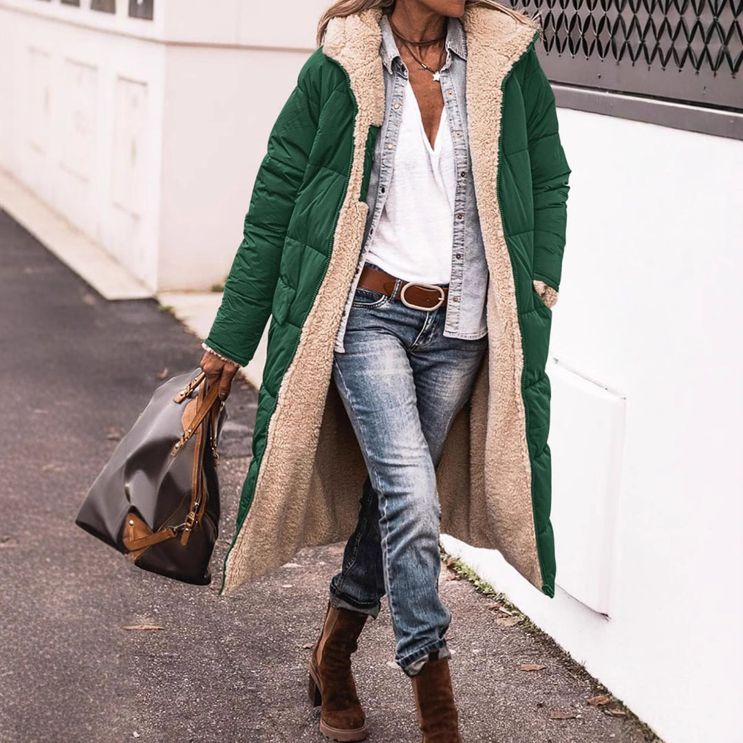 Damernas vinterjacka i avslappnad oversized stil med huva och sidofickor Eva Jonsson-Eva Jonsson