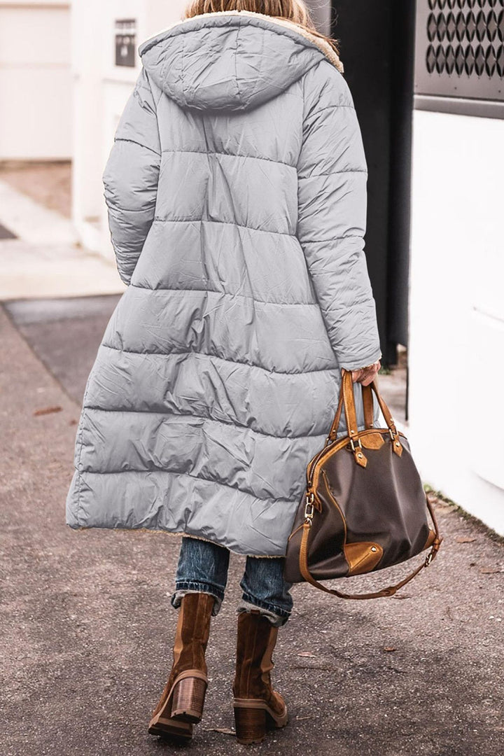 Damernas vinterjacka i avslappnad oversized stil med huva och sidofickor Eva Jonsson-Eva Jonsson