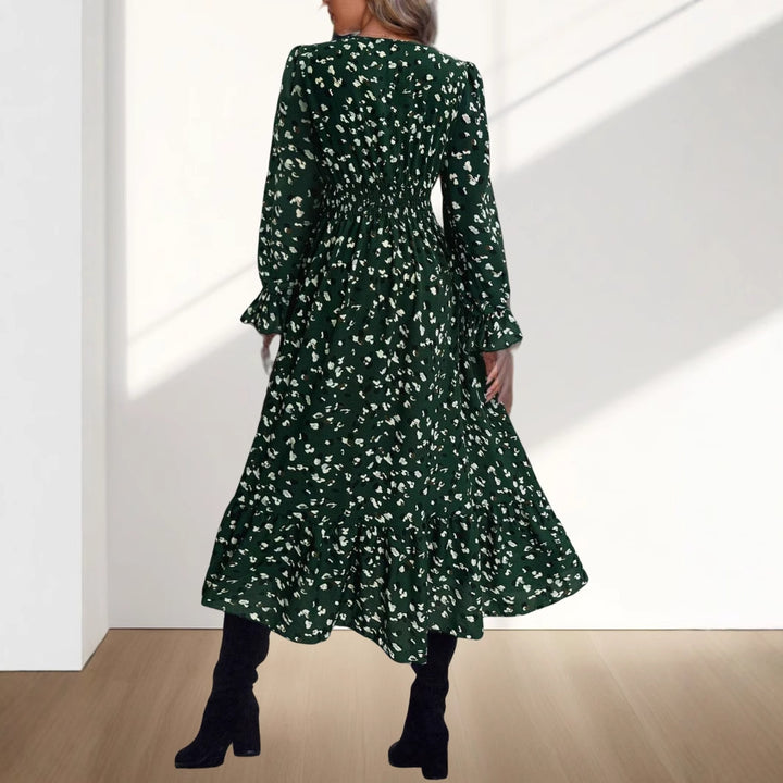 Damernas wrapklänning med figursydd passform och blommönster Mirla-Eva Jonsson