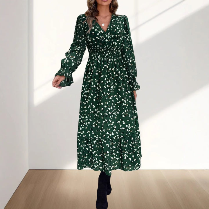 Damernas wrapklänning med figursydd passform och blommönster Mirla-Eva Jonsson
