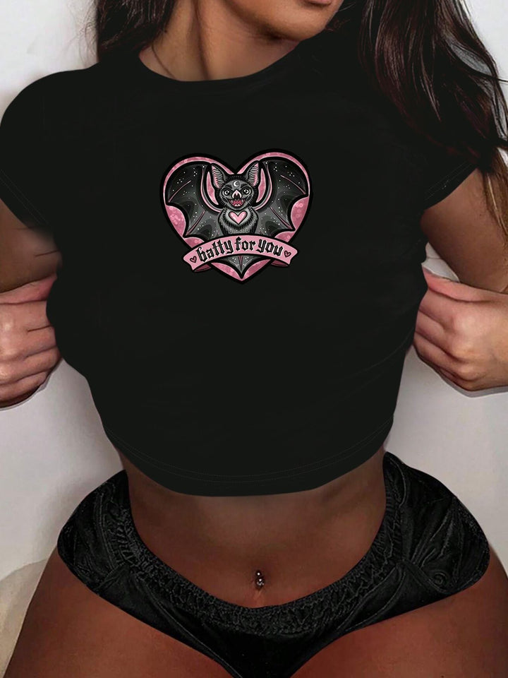 Damers Crop-T-Shirt med konstnärligt läppmotiv och kreativt tryck Mirla-Eva Jonsson