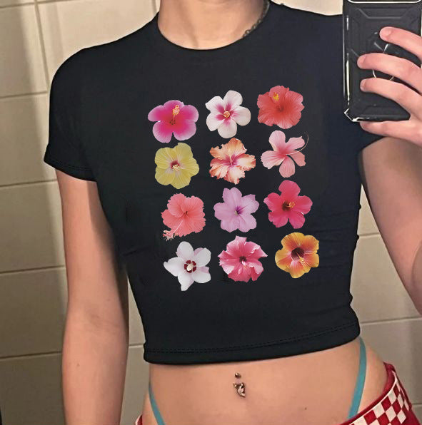 Damers Crop-T-shirt med kreativt motiv och figurnära snitt Mirla-Eva Jonsson