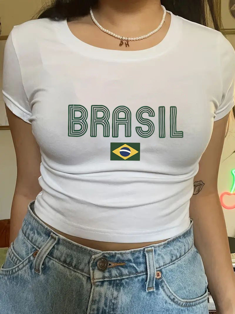 Damers Crop-T-shirt med kreativt motiv och figurnära snitt Mirla-Eva Jonsson