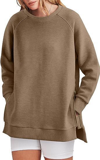 Damers modernt sweatshirt med sidodragkedjor Mirla-Eva Jonsson