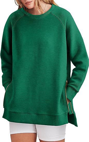 Damers modernt sweatshirt med sidodragkedjor Mirla-Eva Jonsson