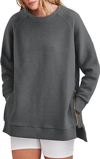 Damers modernt sweatshirt med sidodragkedjor Mirla-Eva Jonsson