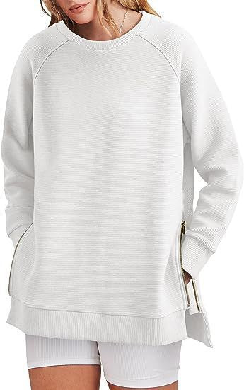 Damers modernt sweatshirt med sidodragkedjor Mirla-Eva Jonsson