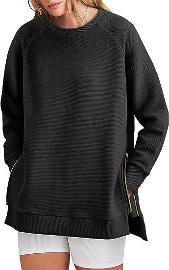 Damers modernt sweatshirt med sidodragkedjor Mirla-Eva Jonsson