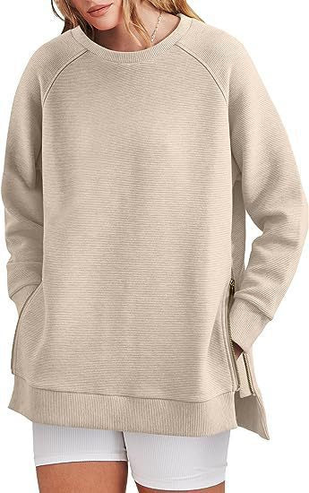 Damers modernt sweatshirt med sidodragkedjor Mirla-Eva Jonsson
