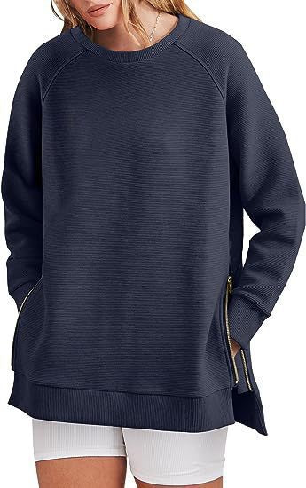 Damers modernt sweatshirt med sidodragkedjor Mirla-Eva Jonsson