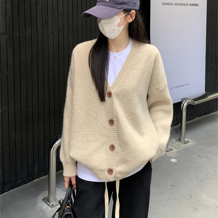 Damers oversized cardigan med stora knappar och avslappnad passform Mirla-Eva Jonsson