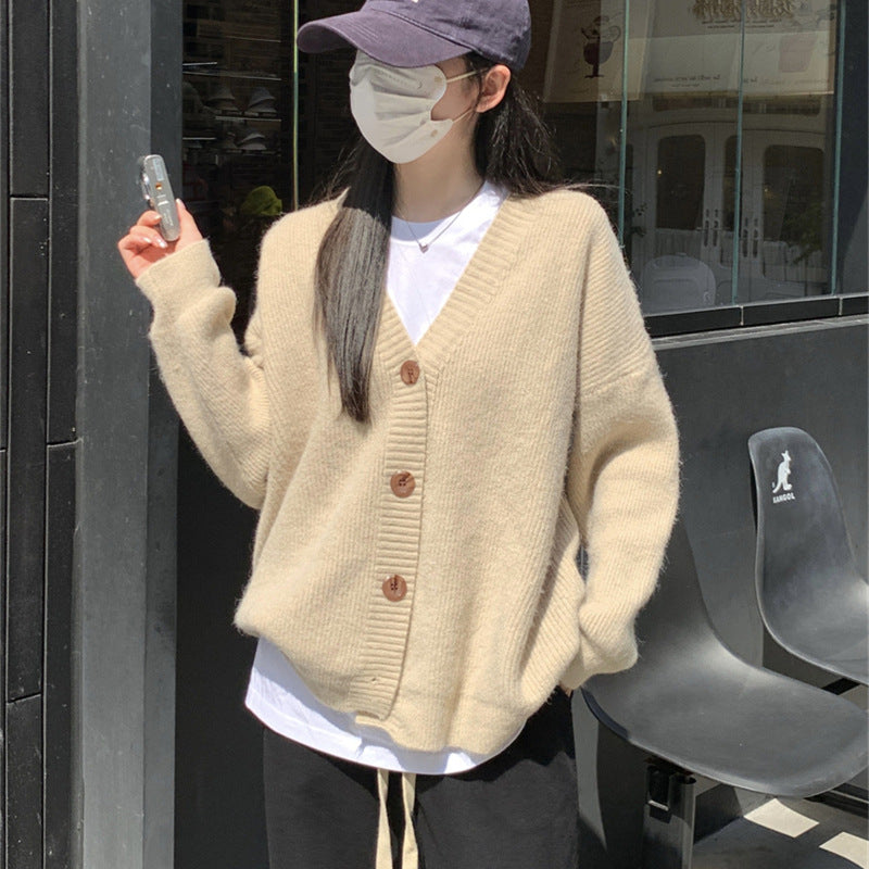 Damers oversized cardigan med stora knappar och avslappnad passform Mirla-Eva Jonsson