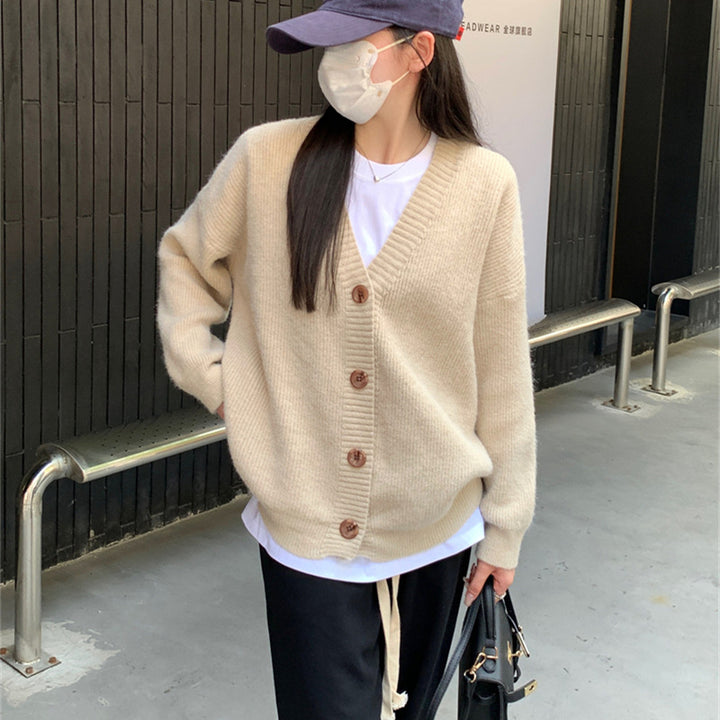 Damers oversized cardigan med stora knappar och avslappnad passform Mirla-Eva Jonsson