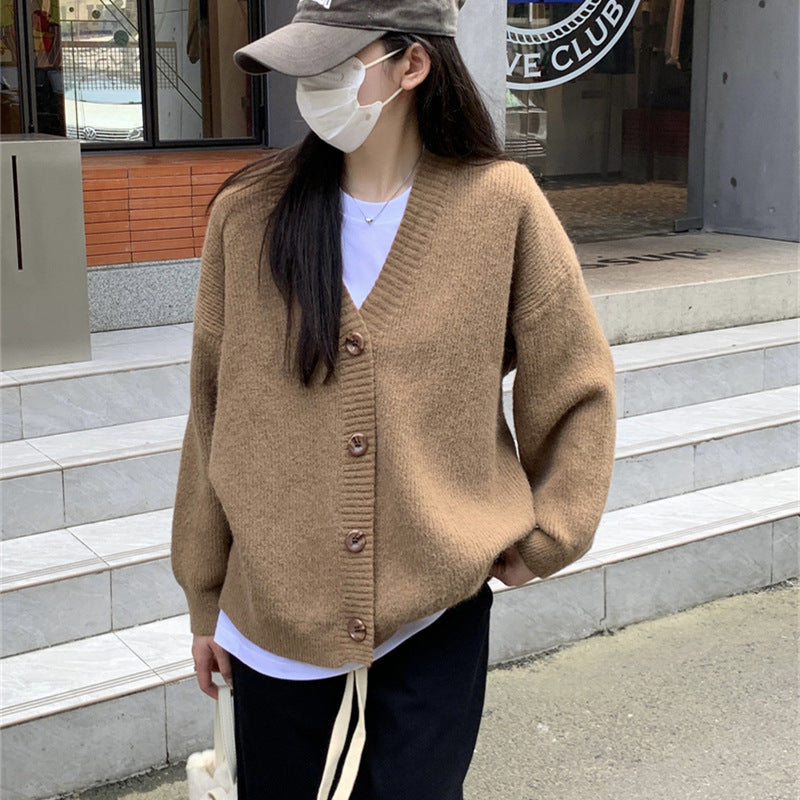 Damers oversized cardigan med stora knappar och avslappnad passform Mirla-Eva Jonsson