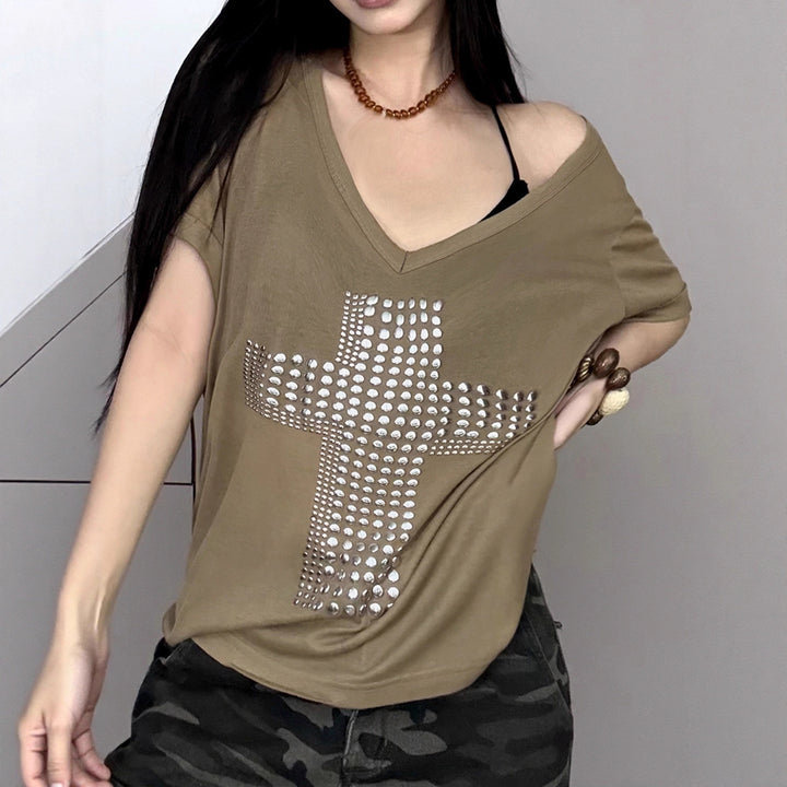 Damers stiliga oversized T-shirt med korsdesign och glittrande detaljer Mirla-Eva Jonsson