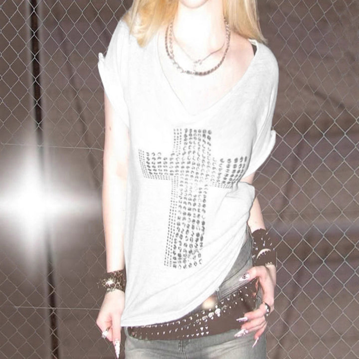 Damers stiliga oversized T-shirt med korsdesign och glittrande detaljer Mirla-Eva Jonsson
