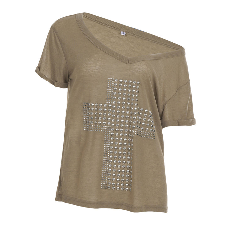 Damers stiliga oversized T-shirt med korsdesign och glittrande detaljer Mirla-Eva Jonsson