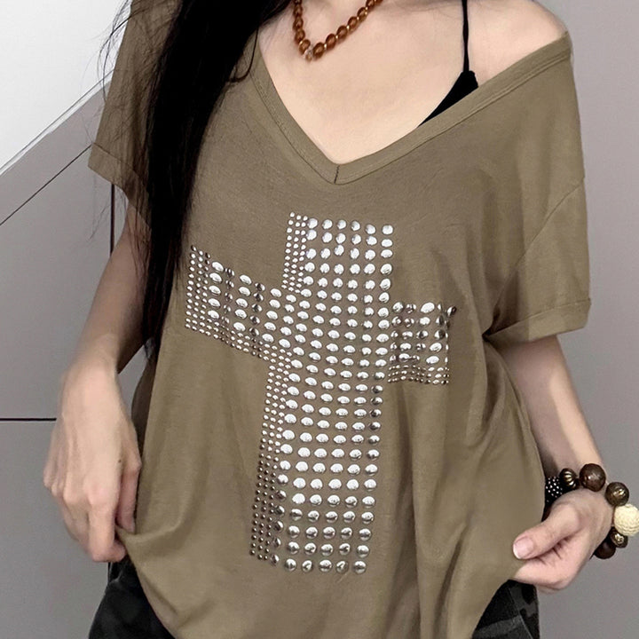 Damers stiliga oversized T-shirt med korsdesign och glittrande detaljer Mirla-Eva Jonsson
