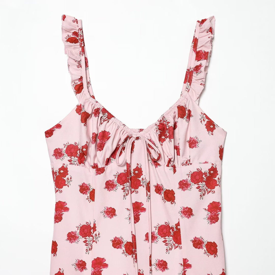 Dames spaghetti strap dress with delicate floral pattern and voluminous ruffle Mirla-Eva Jonsson