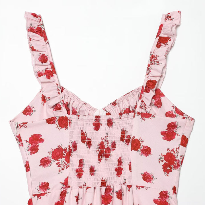 Dames spaghetti strap dress with delicate floral pattern and voluminous ruffle Mirla-Eva Jonsson