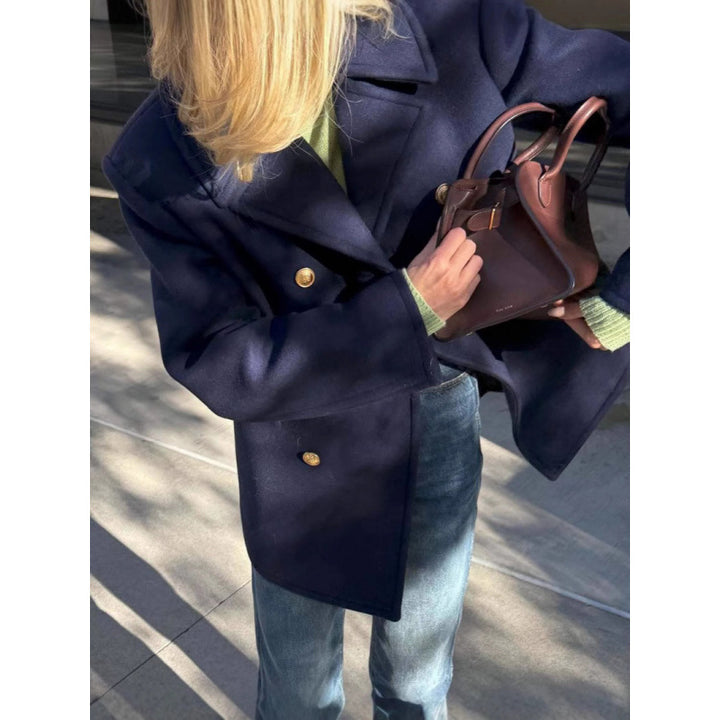 Dameullkappa med dubbel knappstängning och elegant snitt Mirla-Eva Jonsson