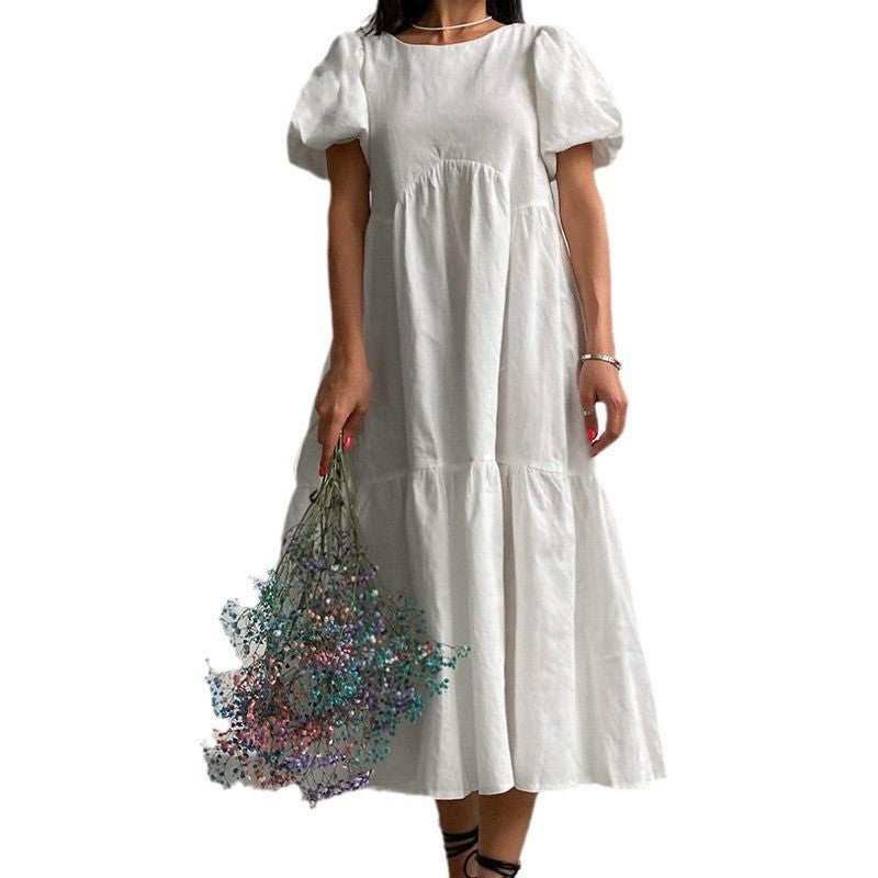 Damh Maxiklänning med voluminösa puffärmar och romantisk design Mirla-Eva Jonsson