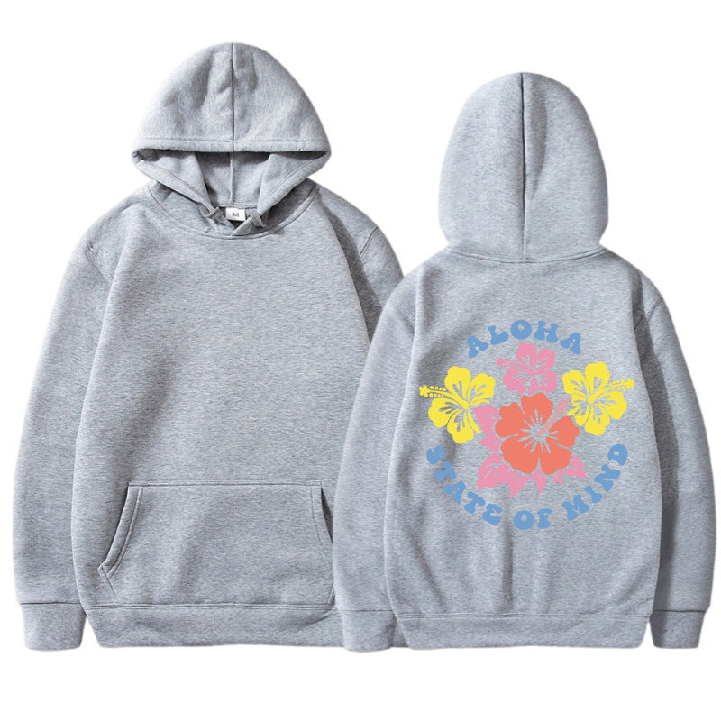 Damhoodie med blommig aloha-design och bekväm passform Mirla-Eva Jonsson