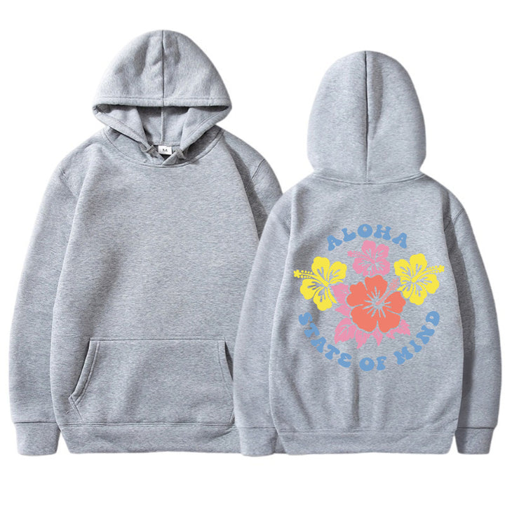 Damhoodie med blommig aloha-design och bekväm passform Mirla-Eva Jonsson