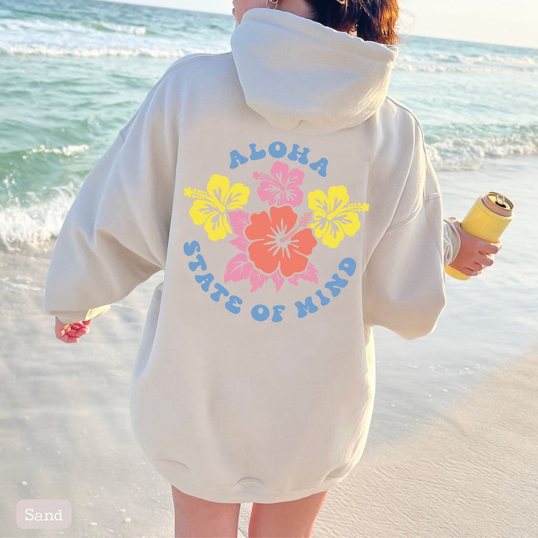 Damhoodie med blommig aloha-design och bekväm passform Mirla-Eva Jonsson
