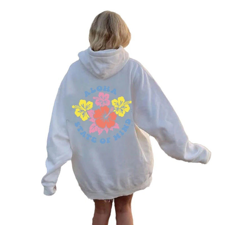 Damhoodie med blommig aloha-design och bekväm passform Mirla-Eva Jonsson
