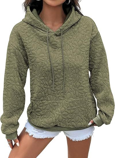 Damhoodie med blommig prägel och generös passform Mirla-Eva Jonsson