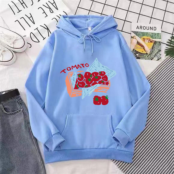 Damhoodie med kreativt grönsaksmotiv Mirla-Eva Jonsson