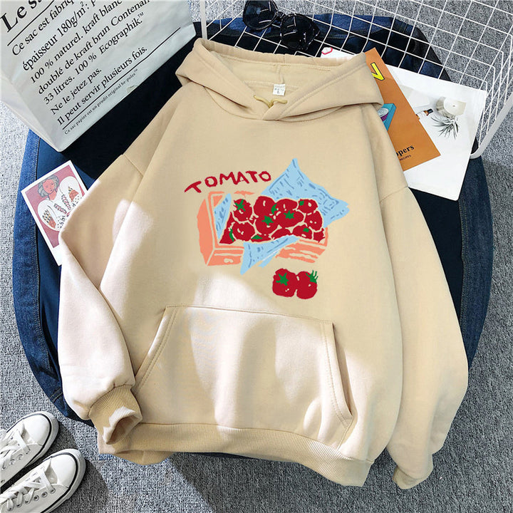 Damhoodie med kreativt grönsaksmotiv Mirla-Eva Jonsson