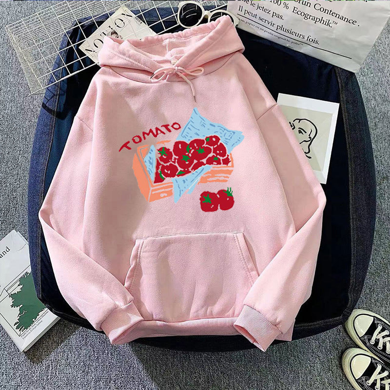 Damhoodie med kreativt grönsaksmotiv Mirla-Eva Jonsson