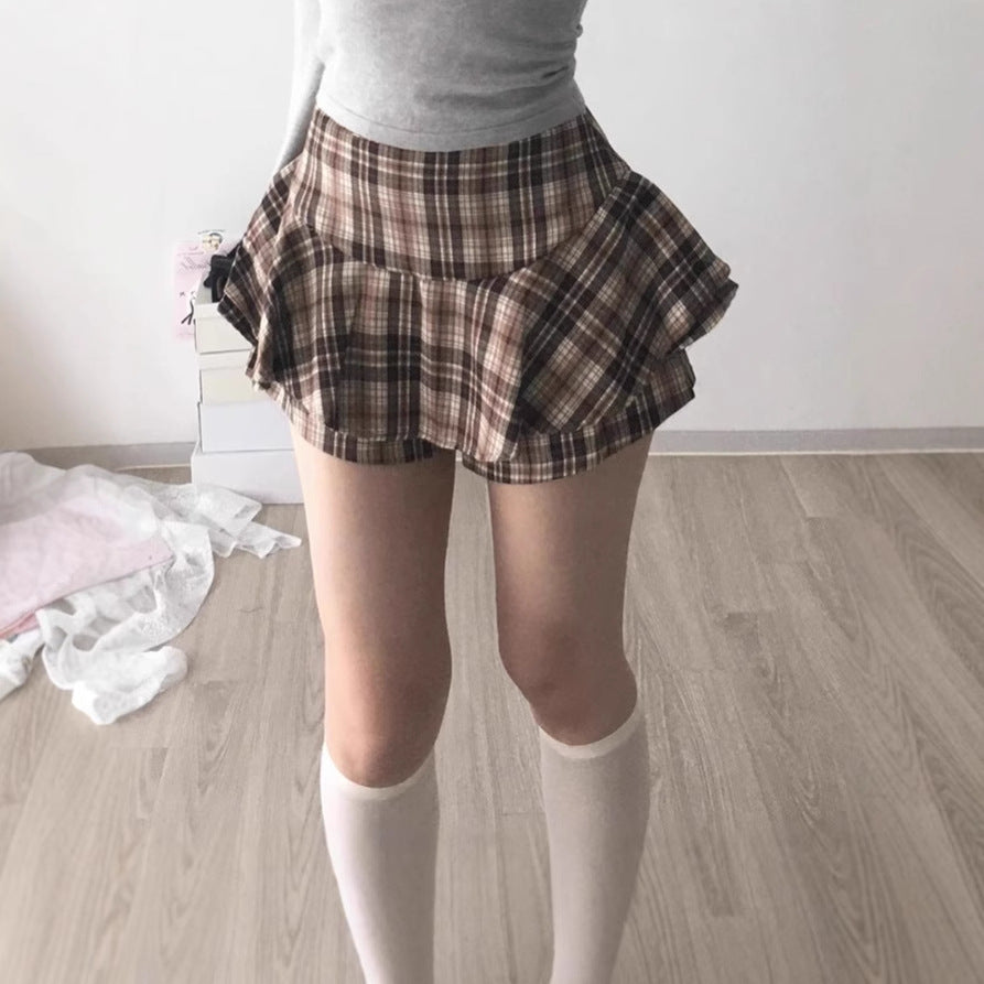 Damig Lekfull rutig kjol med integrerade shorts och hög midja Mirla-Eva Jonsson