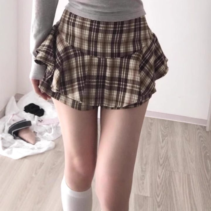 Damig Lekfull rutig kjol med integrerade shorts och hög midja Mirla-Eva Jonsson