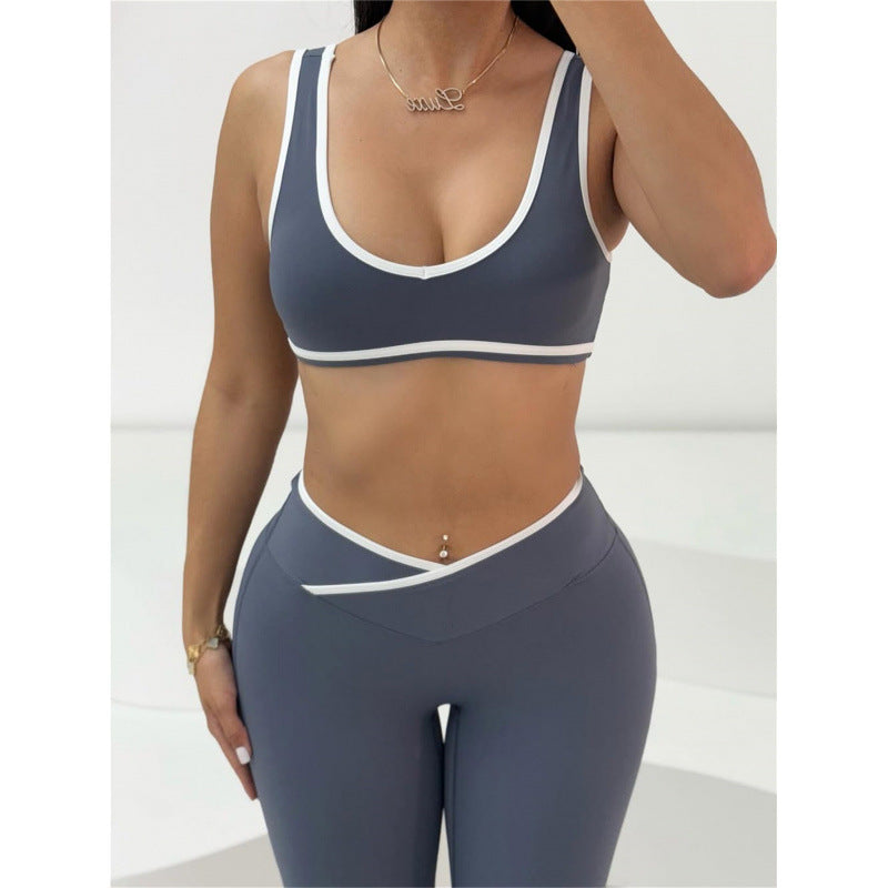 Damig Sportigt Tvådelat Set med Kortsärmad Överdel och Utsvängda Leggings Mirla-Eva Jonsson