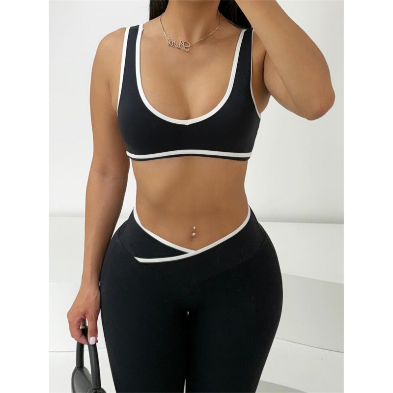 Damig Sportigt Tvådelat Set med Kortsärmad Överdel och Utsvängda Leggings Mirla-Eva Jonsson