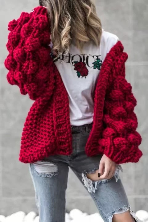 Damig grovstickad oversized cardigan med voluminösa ärmar Mirla-Eva Jonsson