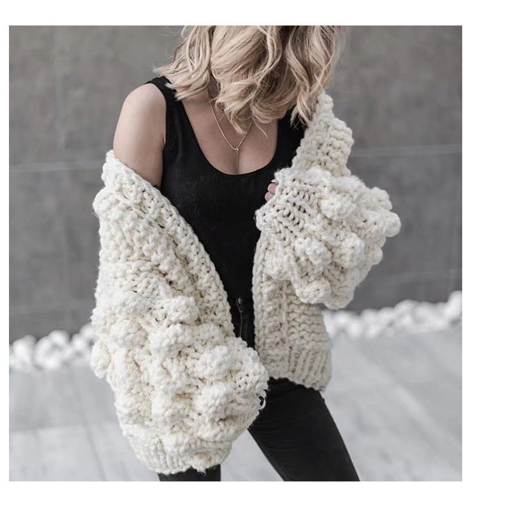 Damig grovstickad oversized cardigan med voluminösa ärmar Mirla-Eva Jonsson