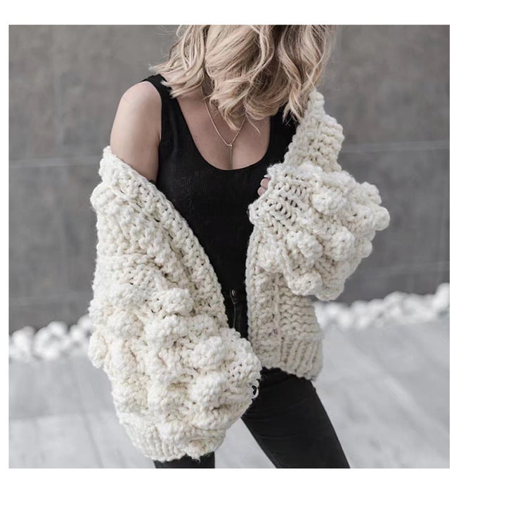 Damig grovstickad oversized cardigan med voluminösa ärmar Mirla-Eva Jonsson