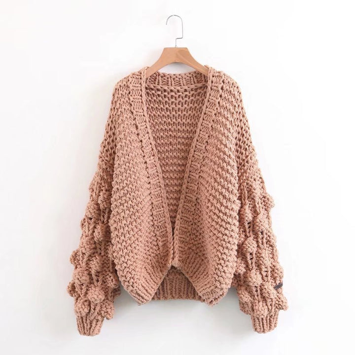 Damig grovstickad oversized cardigan med voluminösa ärmar Mirla-Eva Jonsson