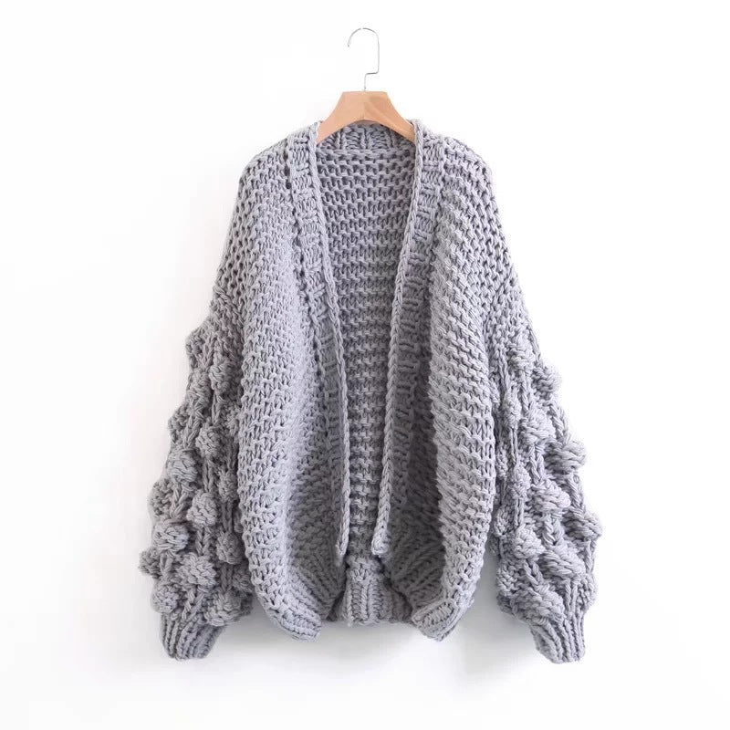 Damig grovstickad oversized cardigan med voluminösa ärmar Mirla-Eva Jonsson