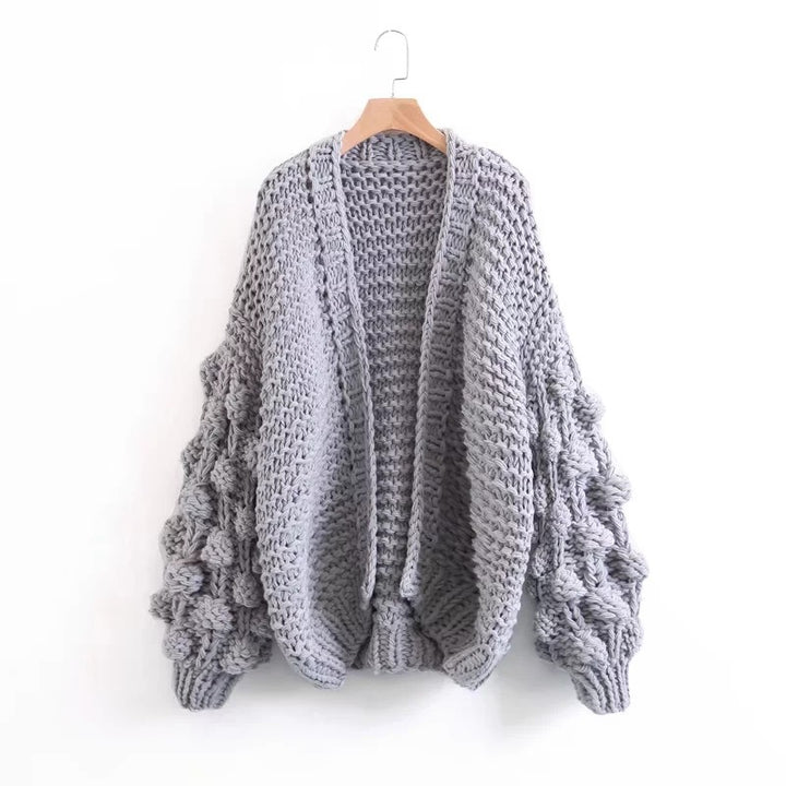 Damig grovstickad oversized cardigan med voluminösa ärmar Mirla-Eva Jonsson