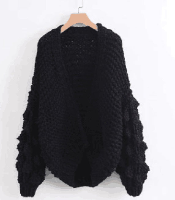 Damig grovstickad oversized cardigan med voluminösa ärmar Mirla-Eva Jonsson