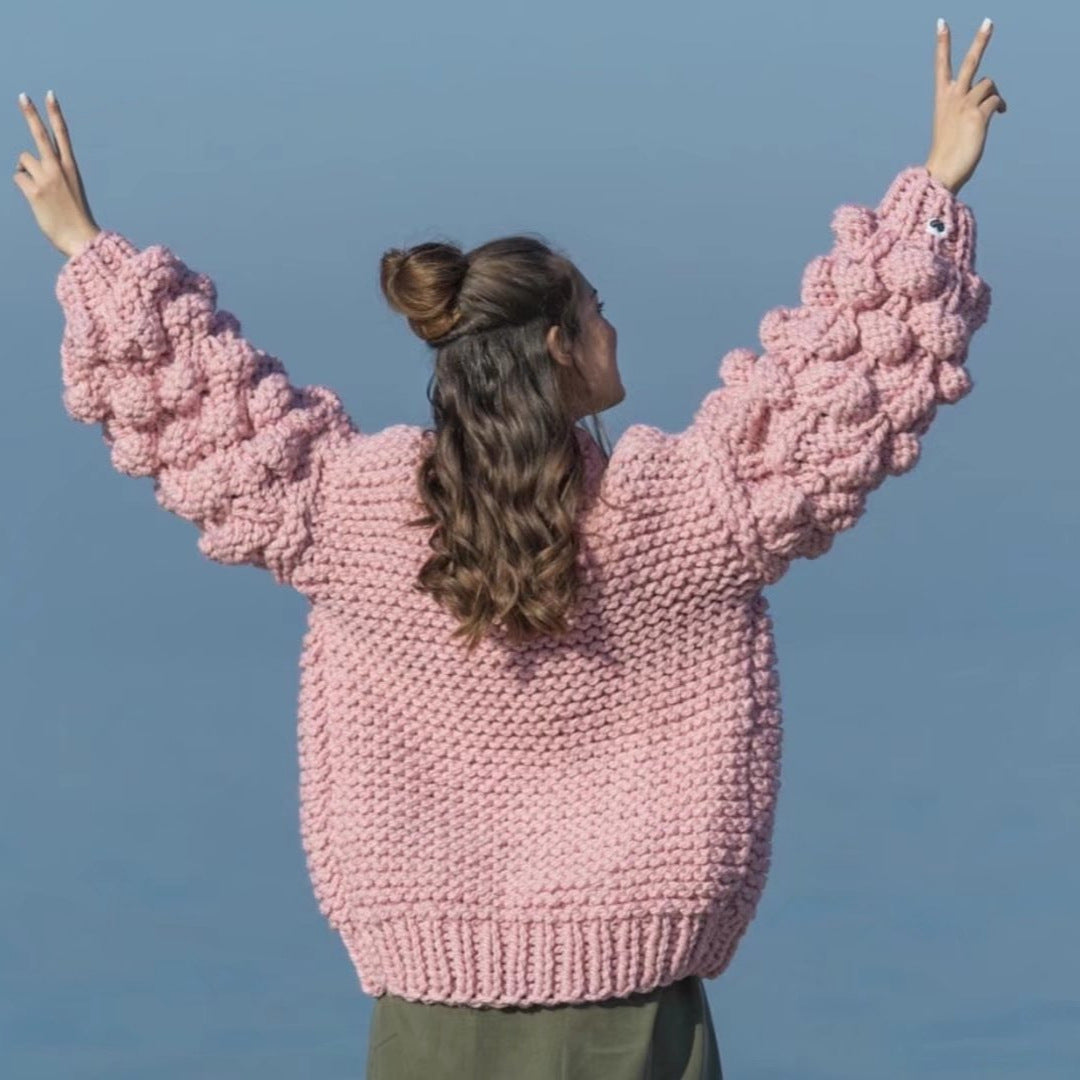 Damig grovstickad oversized cardigan med voluminösa ärmar Mirla-Eva Jonsson