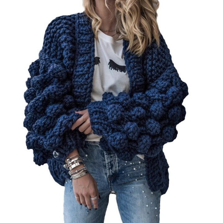 Damig grovstickad oversized cardigan med voluminösa ärmar Mirla-Eva Jonsson